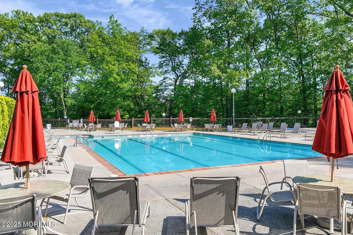 88 Friendship Court Red Bank, NJ 07701 - Photo 31 of 33 a view of house with swimming pool and chair