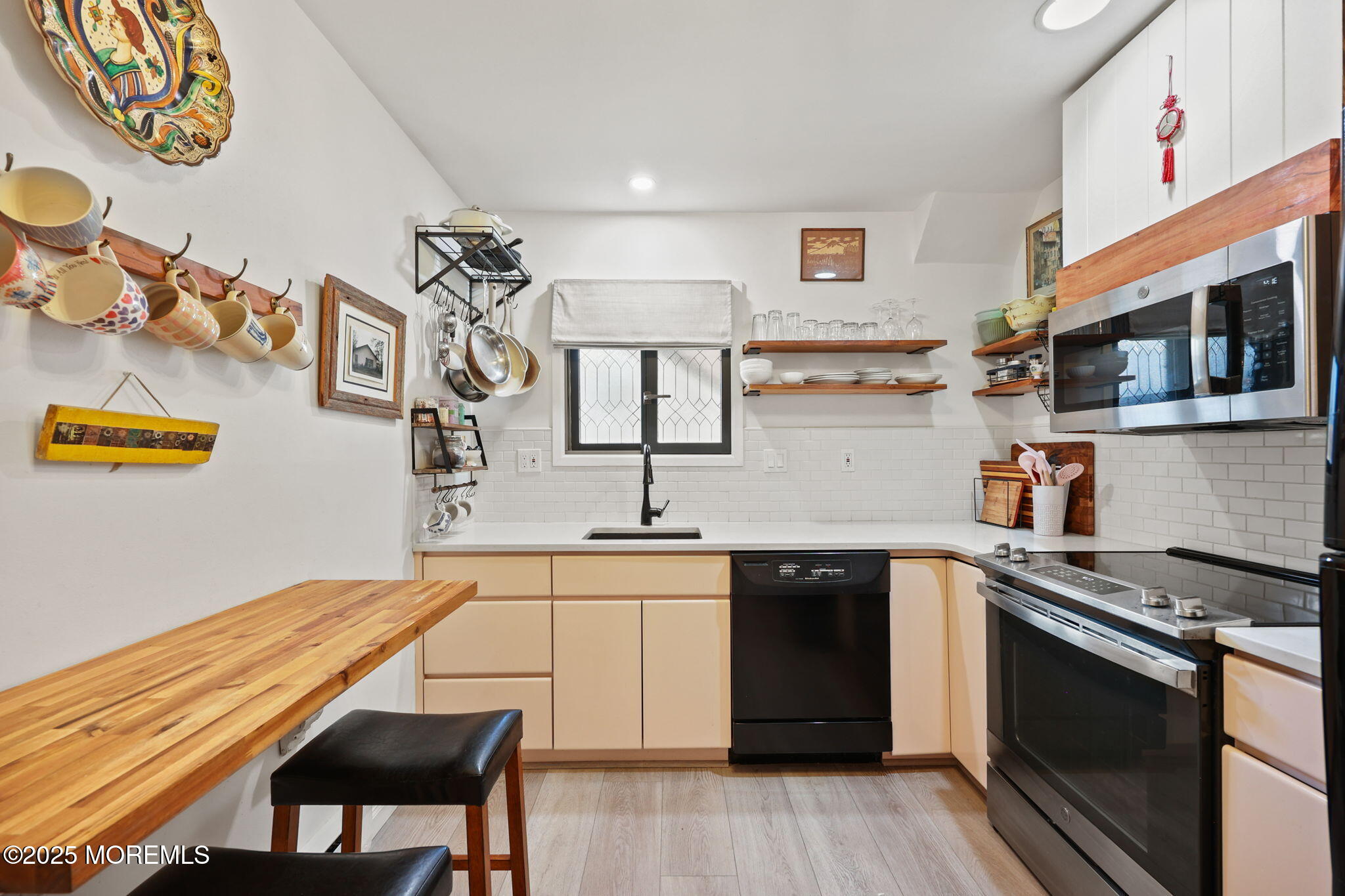 88 Friendship Court Red Bank, NJ 07701 - Photo 7 of 33 a kitchen with stainless steel appliances granite countertop a stove and a sink