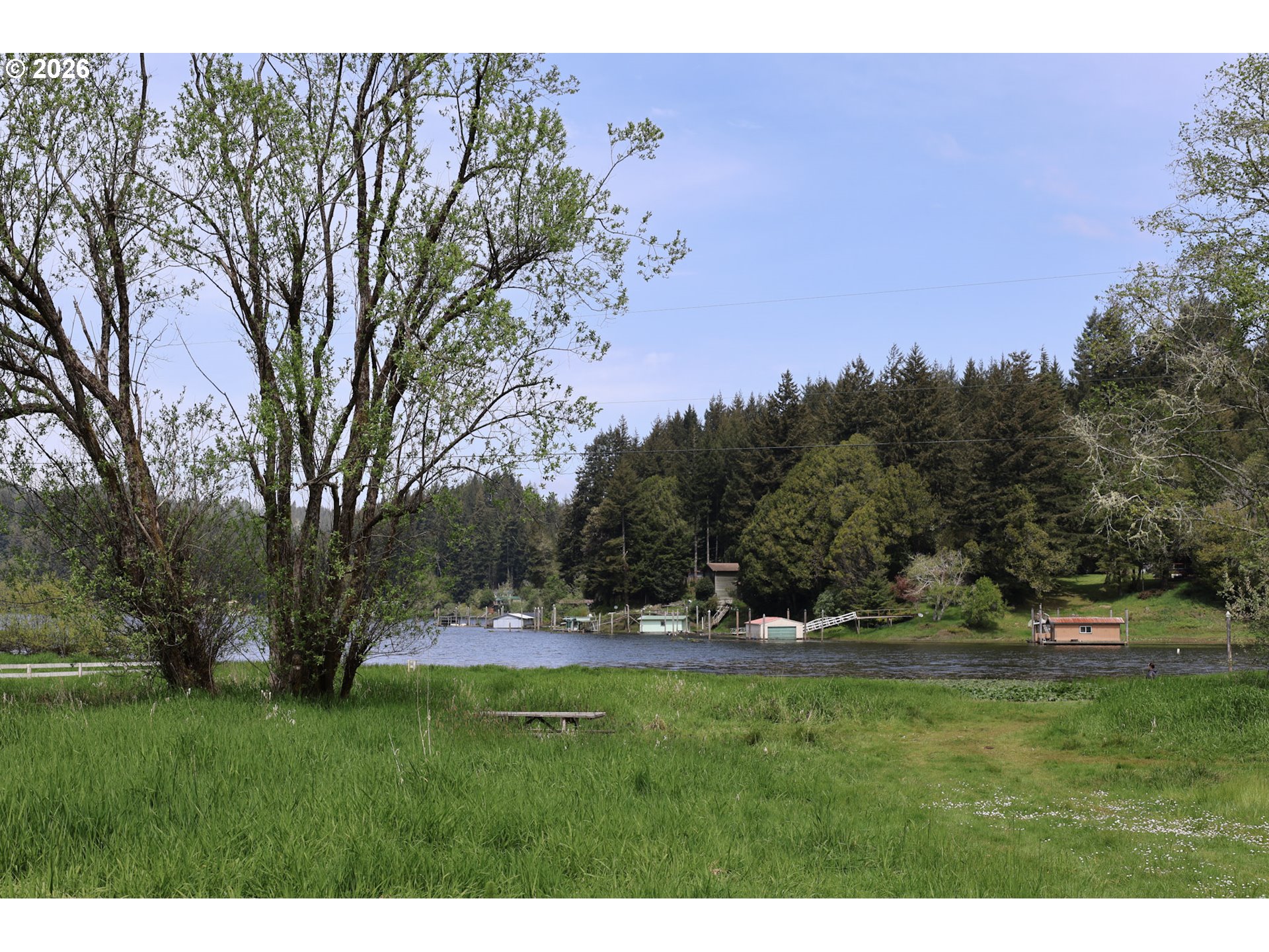 Sun Lake Lakeside, OR 97449 - Photo 1 of 22 a view of outdoor space with green field and trees