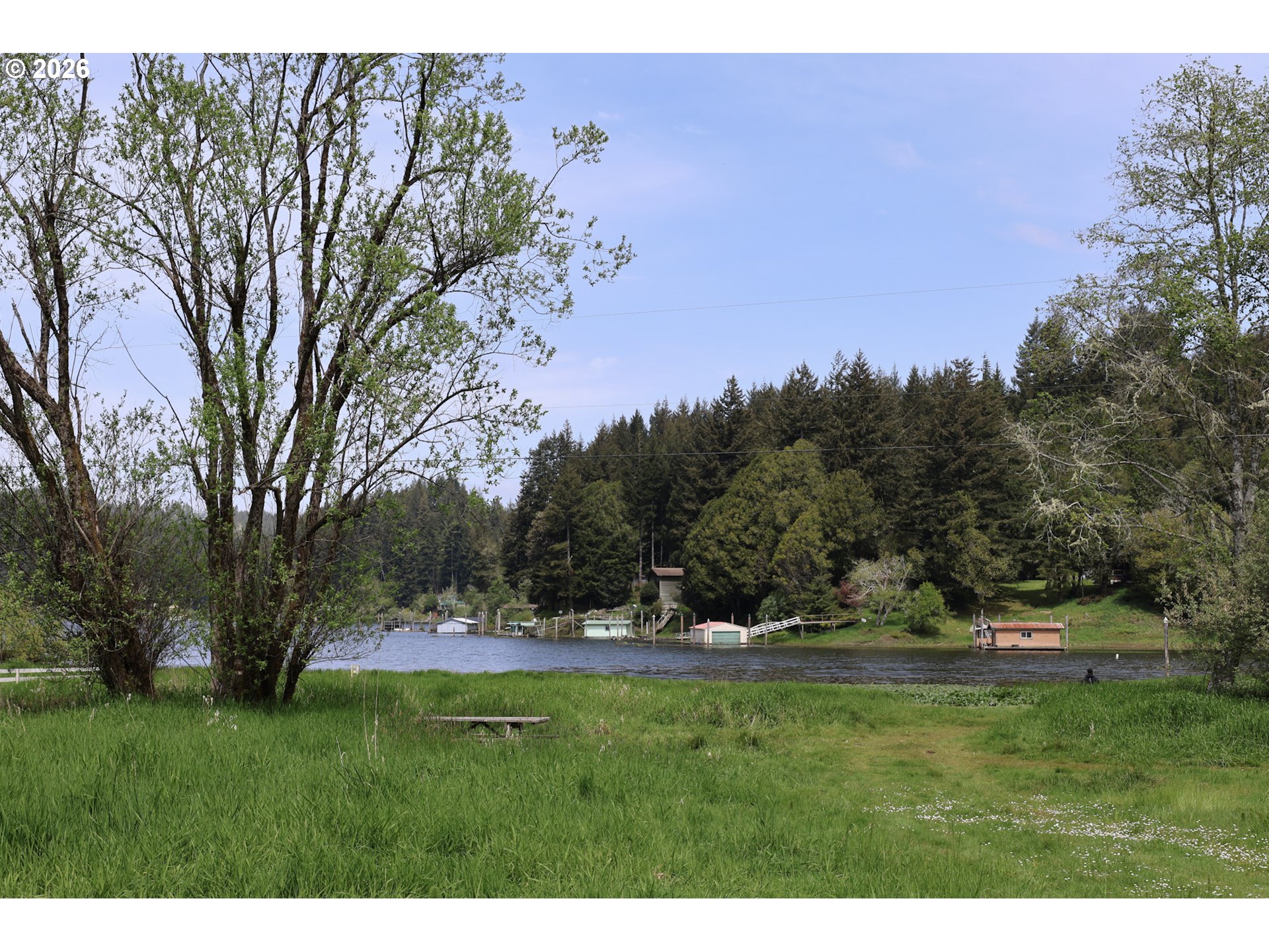 Sun Lake Lakeside, OR 97449 - Photo 21 of 22 a view of outdoor space with green field and trees