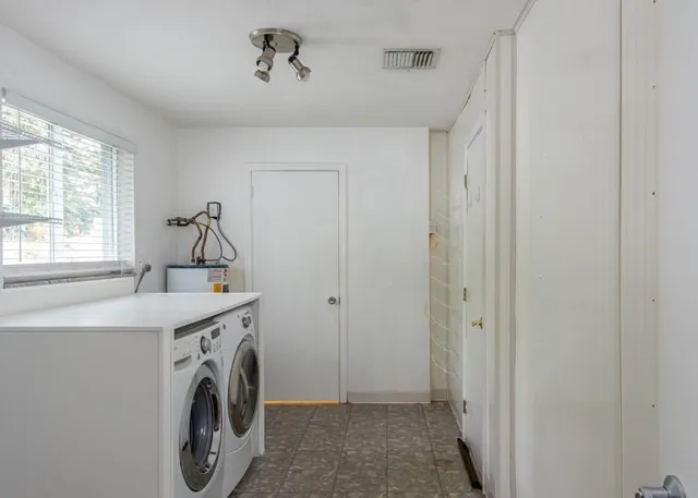 a view of a backyard with small garden