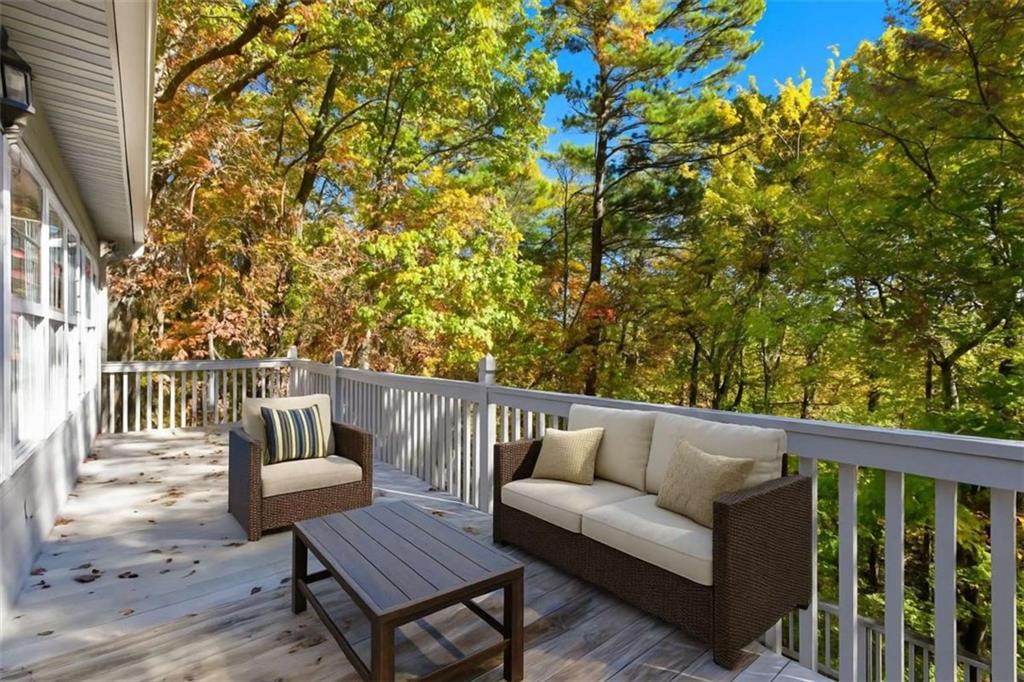 622 Spring Crest Road Cleveland, GA 30528 - Photo 26 of 48 a balcony with wooden floor and fence