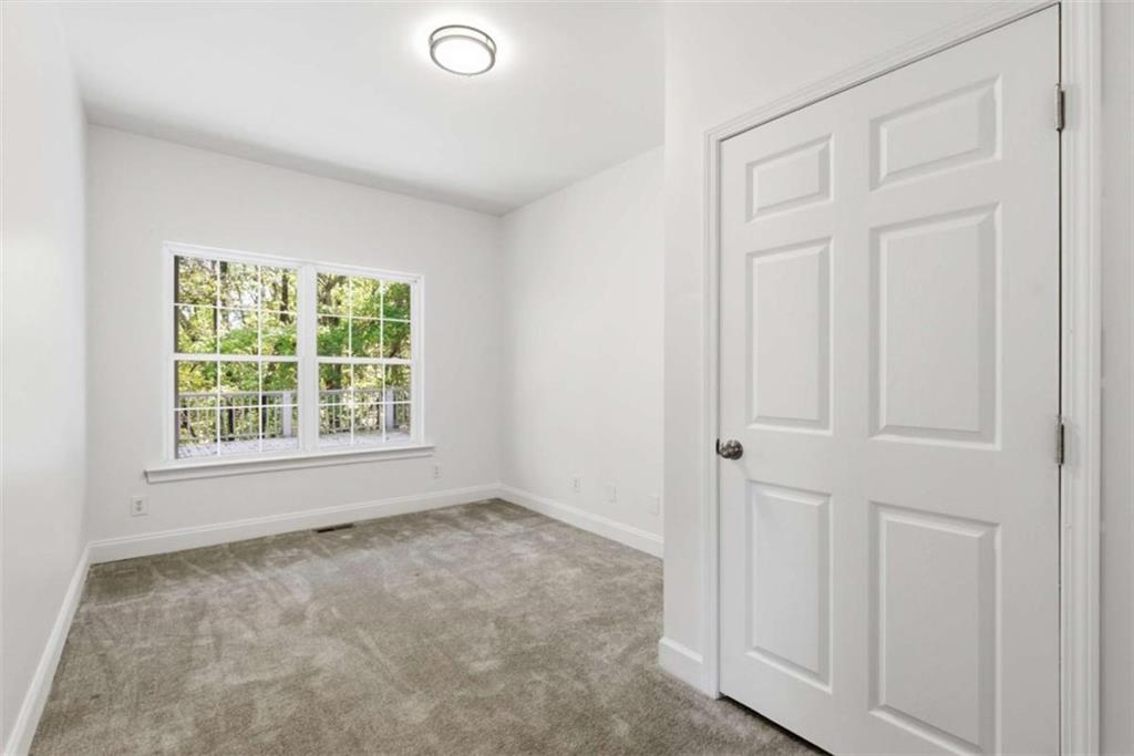 622 Spring Crest Road Cleveland, GA 30528 - Photo 31 of 48 an empty room with windows