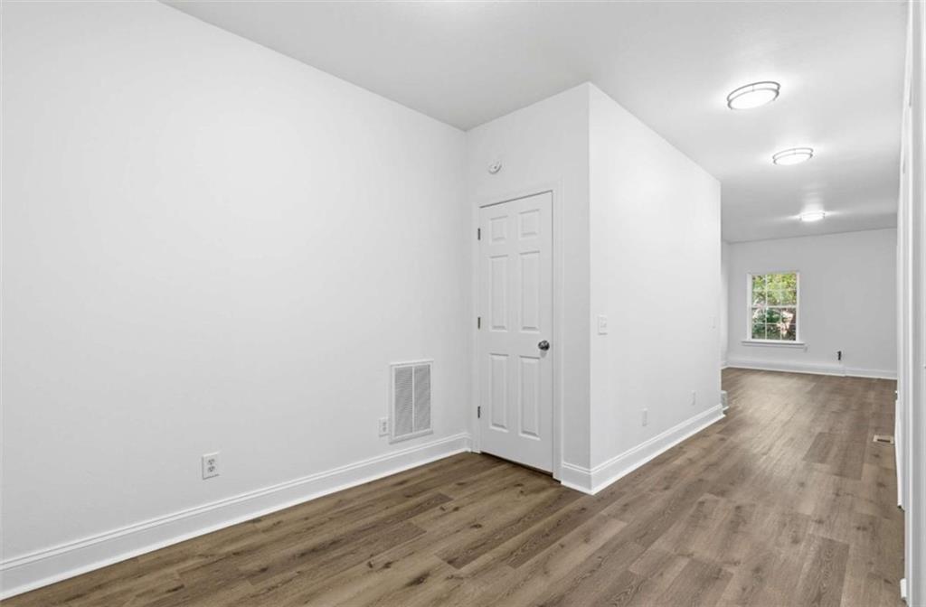 622 Spring Crest Road Cleveland, GA 30528 - Photo 38 of 48 a view of an empty room with wooden floor