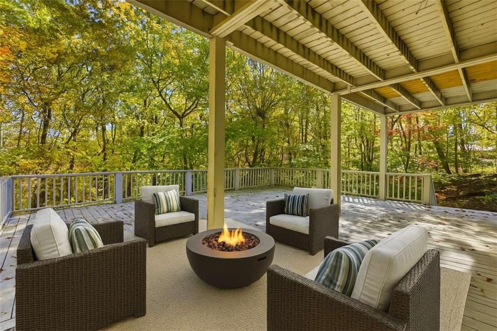 622 Spring Crest Road Cleveland, GA 30528 - Photo 39 of 48 a balcony with furniture and a potted plant