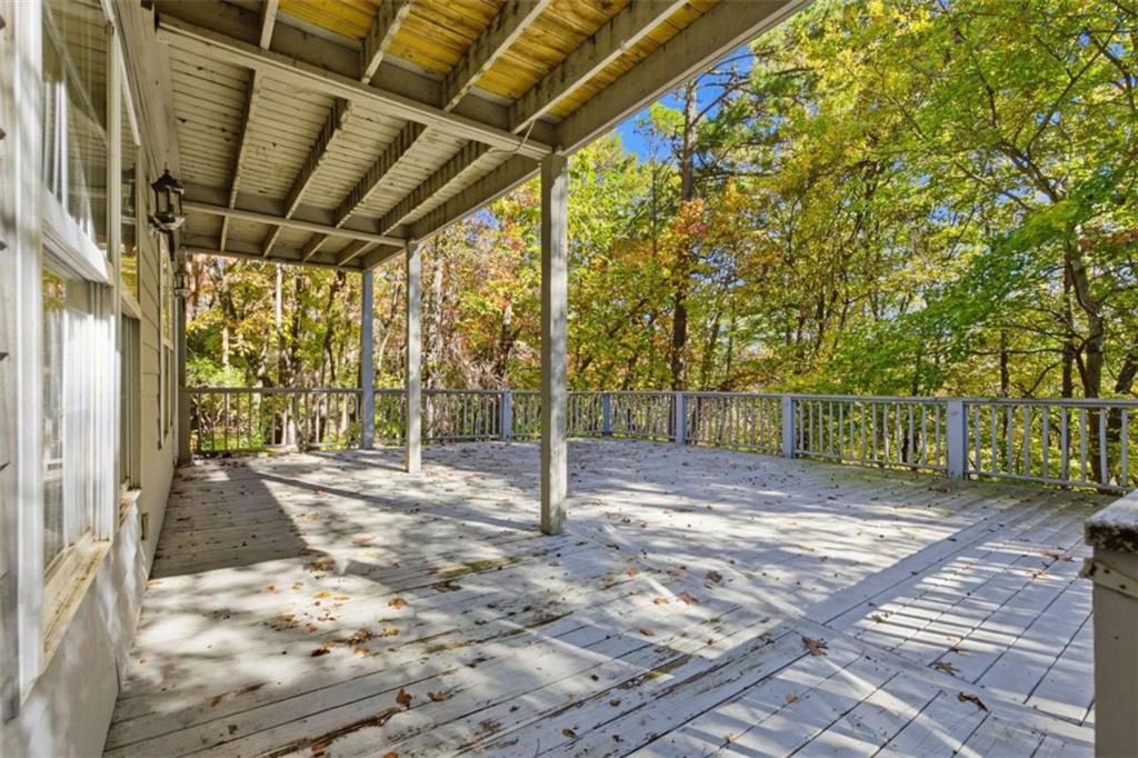 622 Spring Crest Road Cleveland, GA 30528 - Photo 42 of 48 a view of a backyard with wooden fence