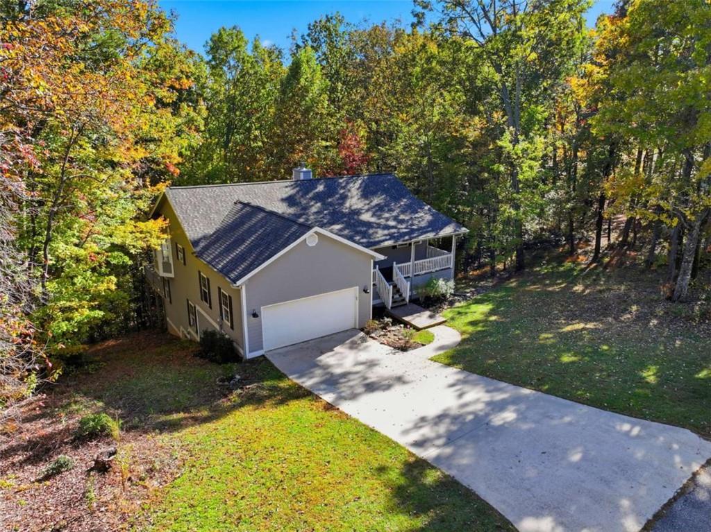 622 Spring Crest Road Cleveland, GA 30528 - Photo 44 of 48 a view of a house with a yard