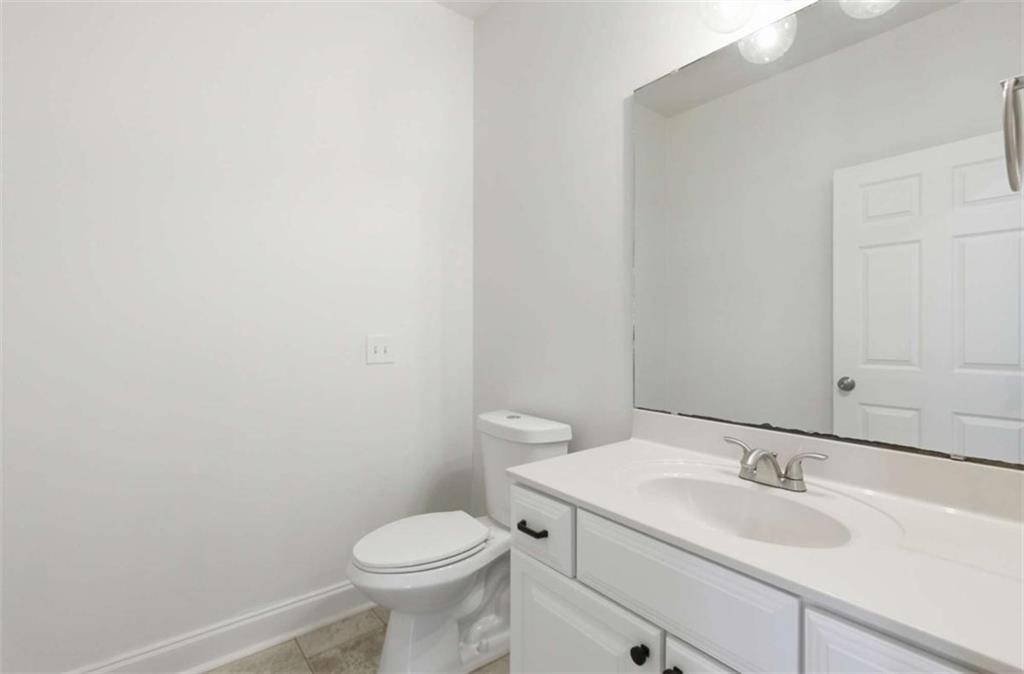 622 Spring Crest Road Cleveland, GA 30528 - Photo 5 of 48 a bathroom with a sink and a toilet