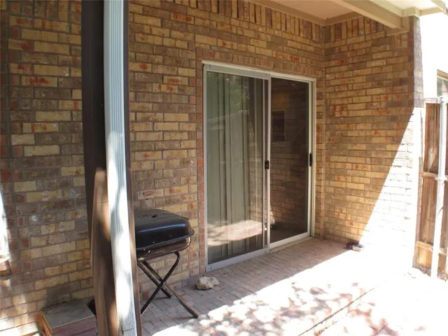 a view of a entryway door front of house
