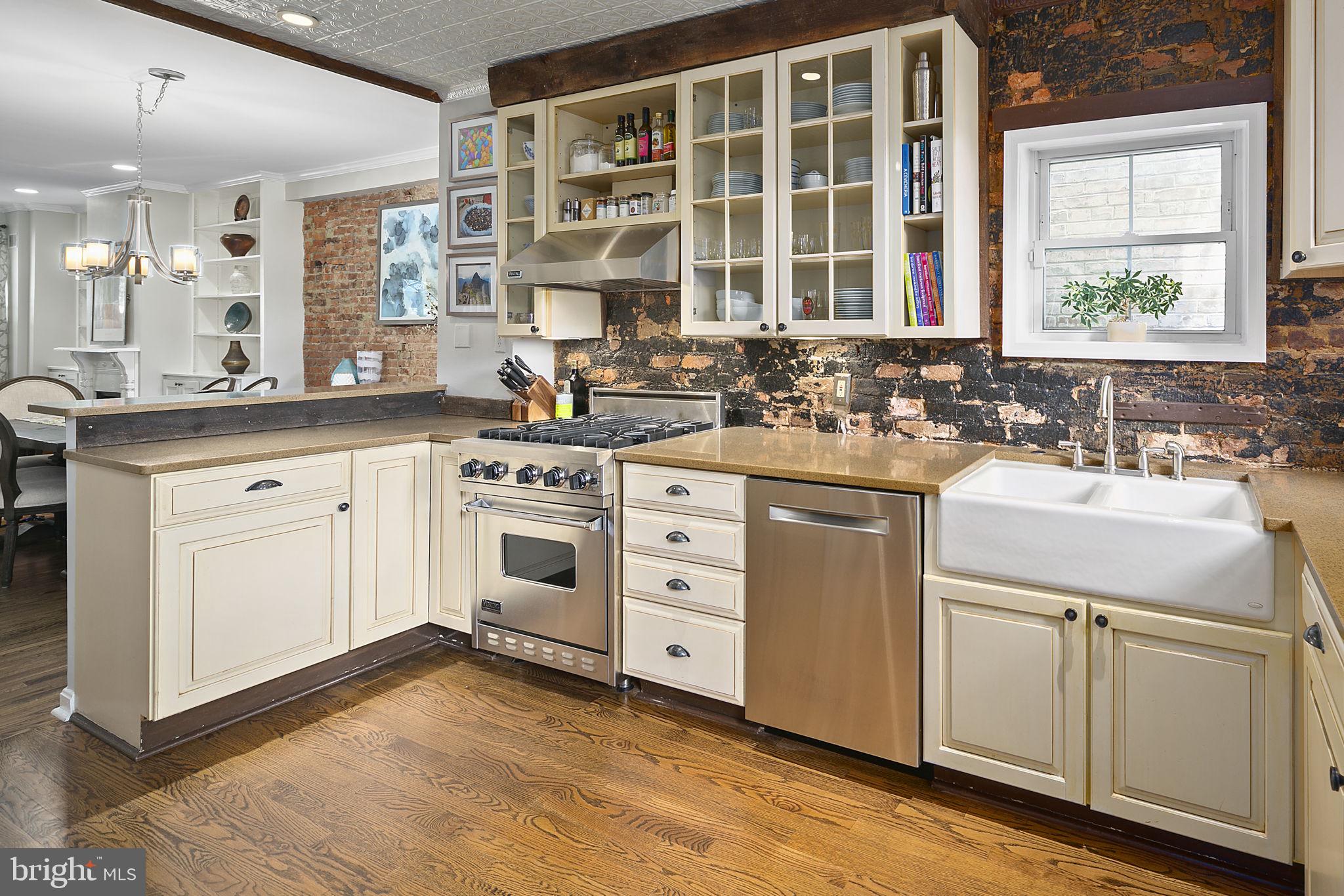 521 5th Street Northeast Washington, DC 20002 - Photo 15 of 48 Exposed brick, Viking range and hood, Bosch dw