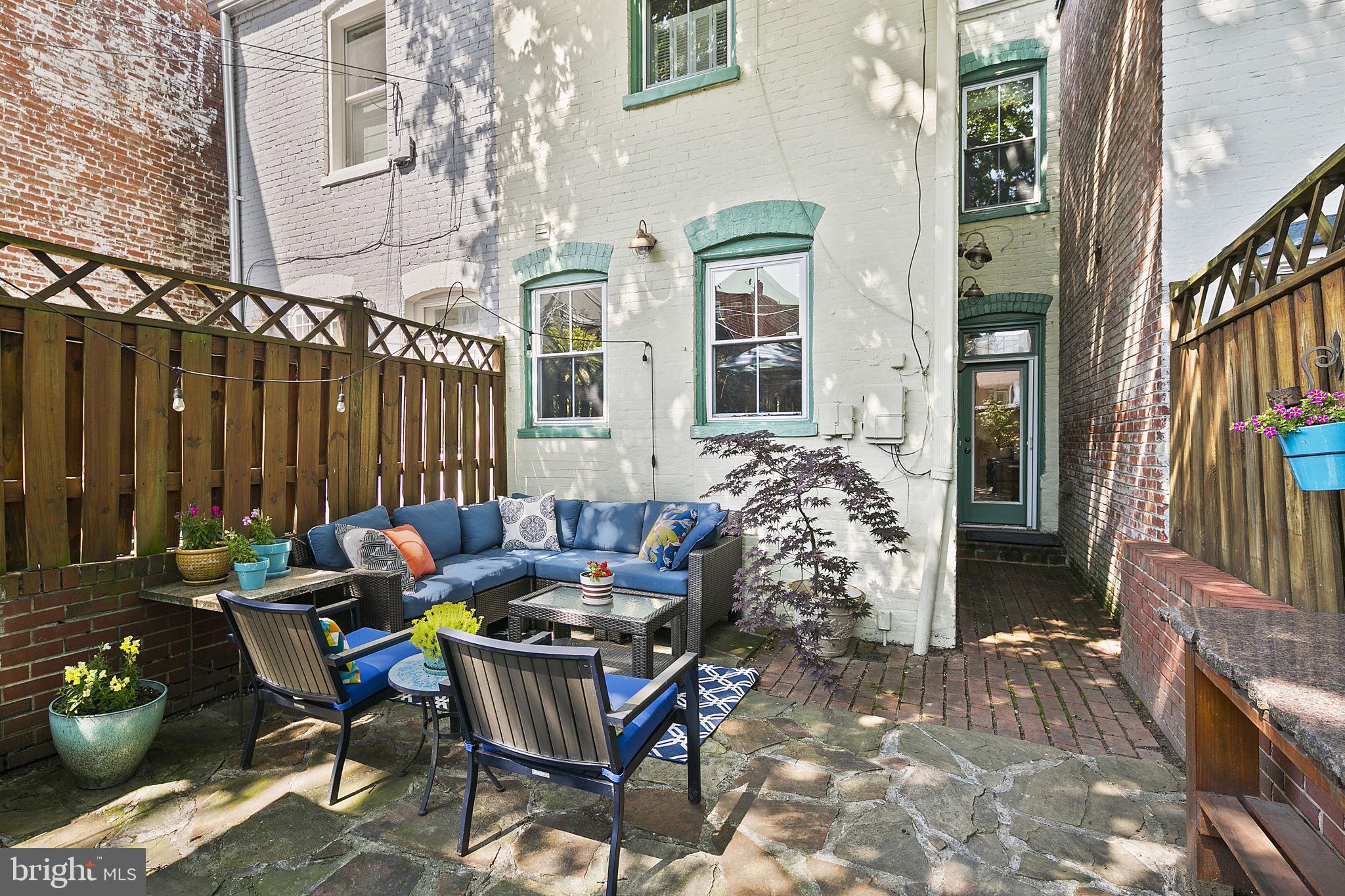 521 5th Street Northeast Washington, DC 20002 - Photo 31 of 48 Huge flagstone backyard - Lounge area and bar