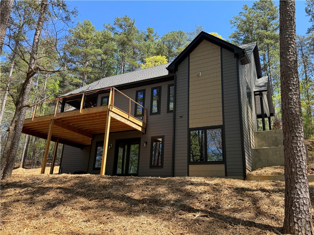 940 Coachmans Trail West Union, SC 29696 - Photo 34 of 41 This newly constructed residence features an inviting deck, perfect for outdoor relaxation.