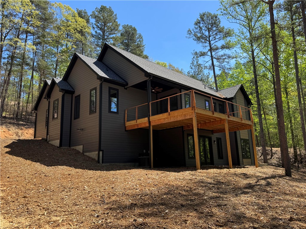 940 Coachmans Trail West Union, SC 29696 - Photo 41 of 41 This newly constructed residence features an inviting deck for outdoor enjoyment amidst lush surroundings.