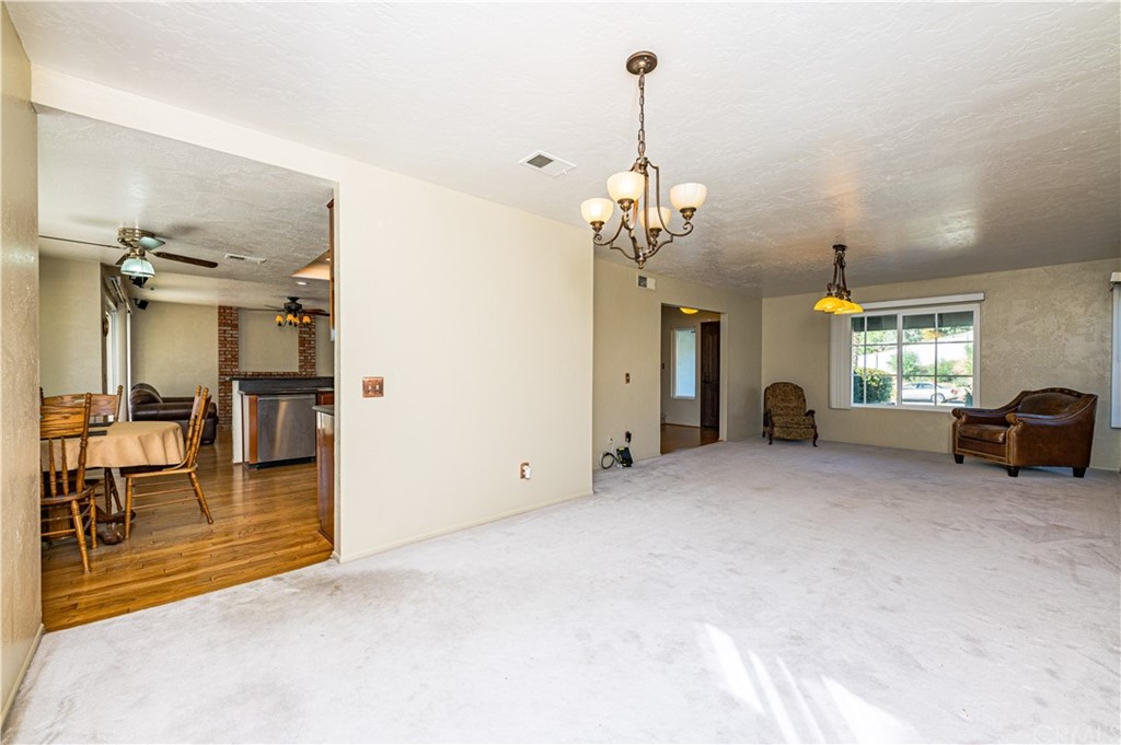 22041 Windtree Avenue Wildomar, CA 92595 - Photo 16 of 47 a view of a livingroom with a furniture