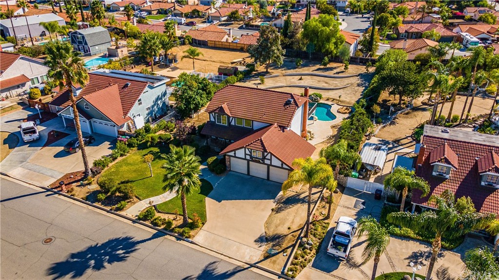 22041 Windtree Avenue Wildomar, CA 92595 - Photo 3 of 47 an aerial view of multiple houses with yard