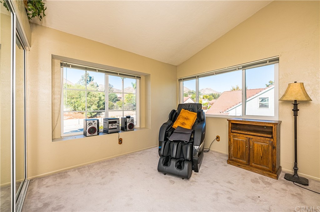 22041 Windtree Avenue Wildomar, CA 92595 - Photo 30 of 47 a view of front door with furniture and a window