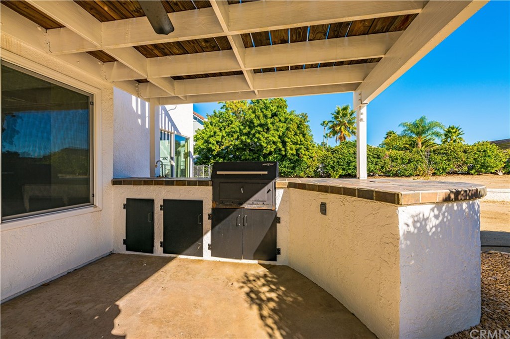 22041 Windtree Avenue Wildomar, CA 92595 - Photo 33 of 47 a view of a backyard