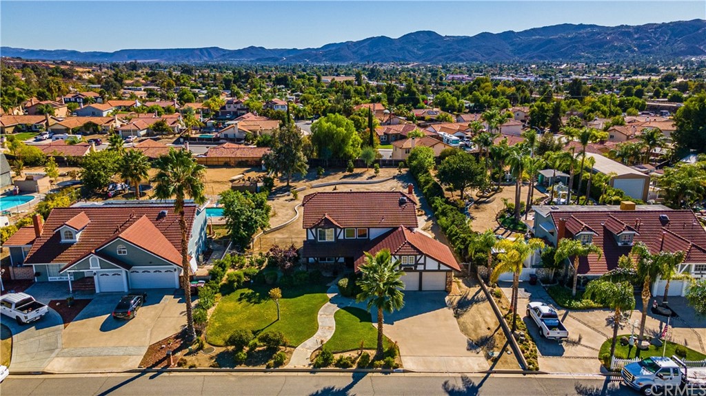 22041 Windtree Avenue Wildomar, CA 92595 - Photo 5 of 47 an aerial view of residential houses and outdoor space