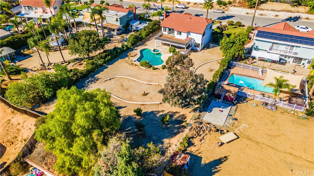 22041 Windtree Avenue Wildomar, CA 92595 - Photo 44 of 47 an aerial view of a house with a yard and garden