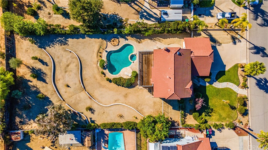 22041 Windtree Avenue Wildomar, CA 92595 - Photo 45 of 47 an aerial view of a house with a yard and trees