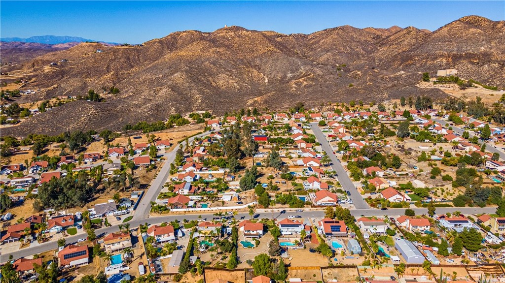 22041 Windtree Avenue Wildomar, CA 92595 - Photo 47 of 47 a view of a building with mountains in the background