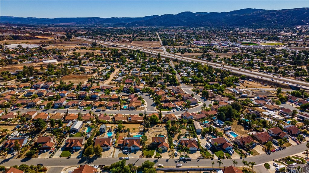 22041 Windtree Avenue Wildomar, CA 92595 - Photo 6 of 47 an aerial view of residential house and sandy dunes