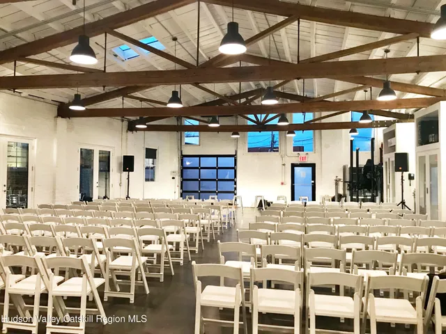 a view of a dinning table and chairs in the patio