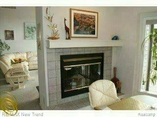 341 Ridgemont Road Oxford, MI 48370 - Photo 8 of 23 2-Way Fireplace - Brkfst Rm & GR