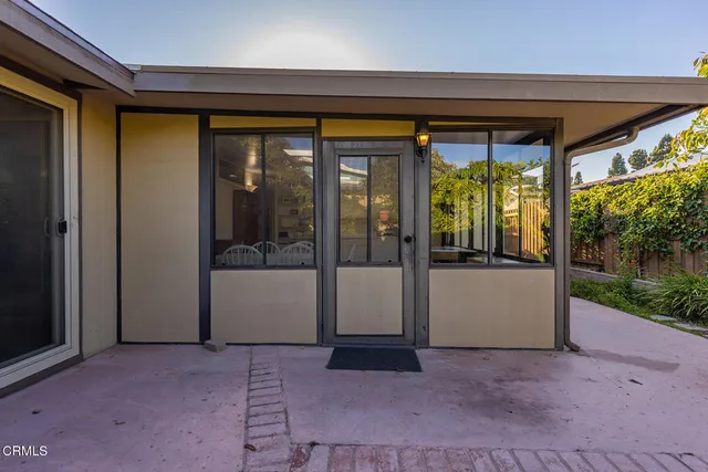a view of a house with a porch