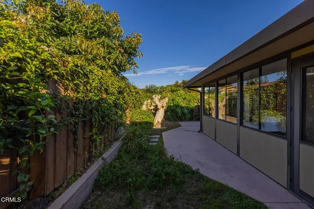a garden view with a seating space
