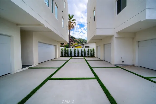 a view of balcony with a potted plant