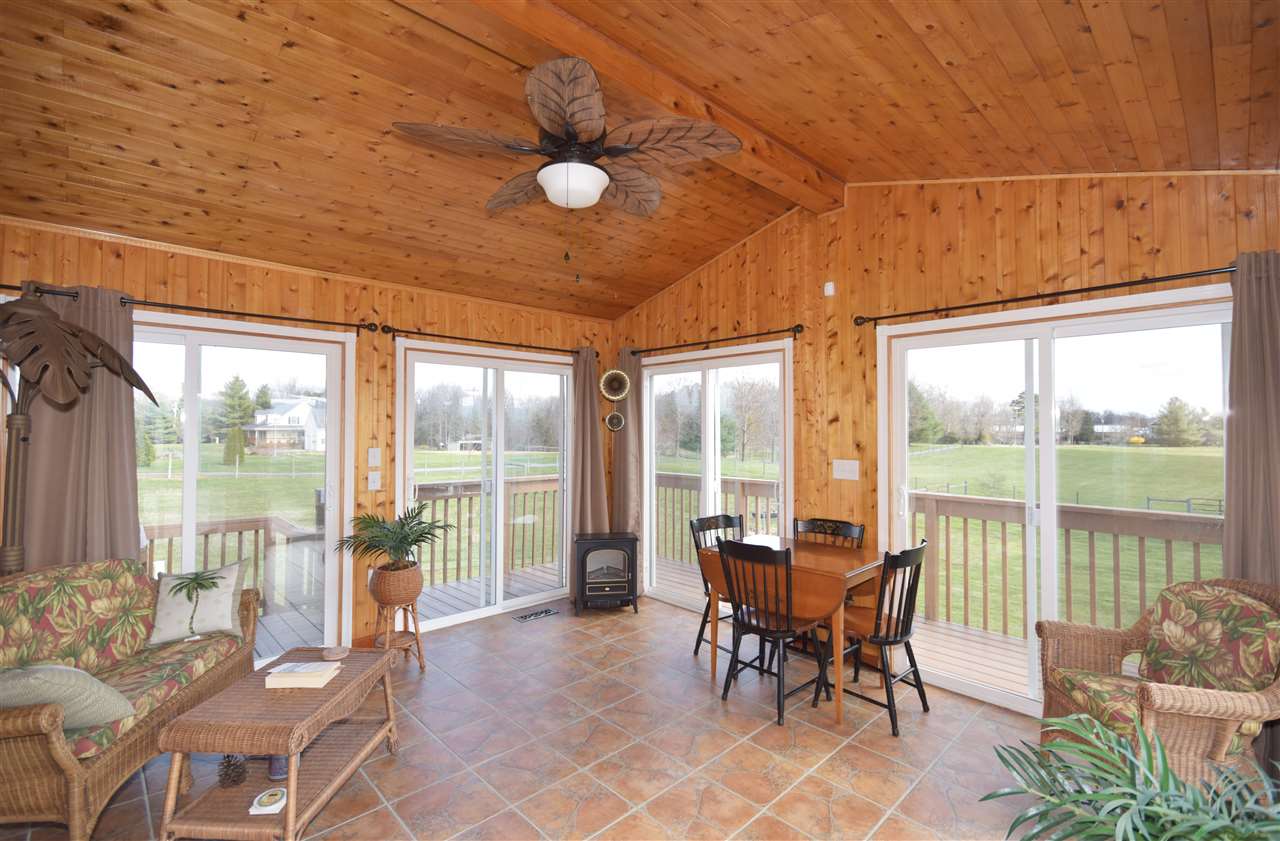 4613 Conicville Road Mount Jackson, VA 22842 - Photo 14 of 35 a dining room with furniture and large windows