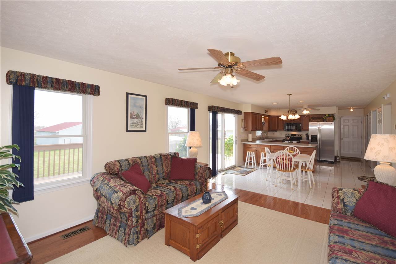 4613 Conicville Road Mount Jackson, VA 22842 - Photo 7 of 35 a living room with furniture kitchen and a chandelier