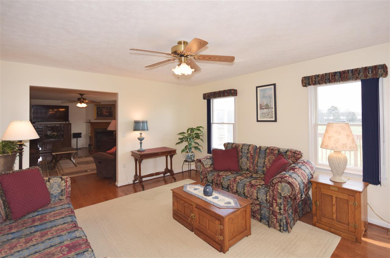 4613 Conicville Road Mount Jackson, VA 22842 - Photo 8 of 35 a living room with furniture a wooden floor and a window