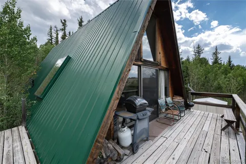 a bedroom with a bed and a view of bathroom