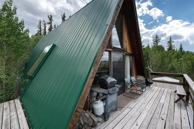 a bedroom with a bed and a view of bathroom