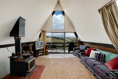 a view of a small house in forest