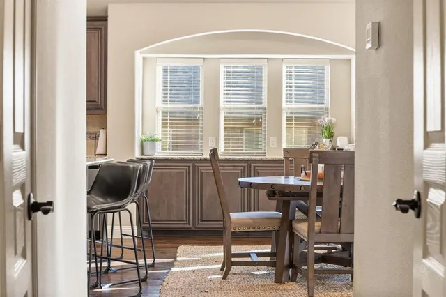 a workspace with furniture and a window