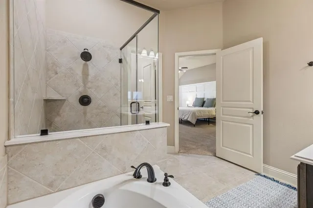 a bathroom with a sink and a shower