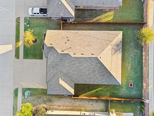 an aerial view of a house having yard