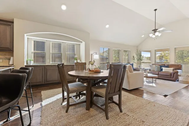 a view of a dining room with furniture