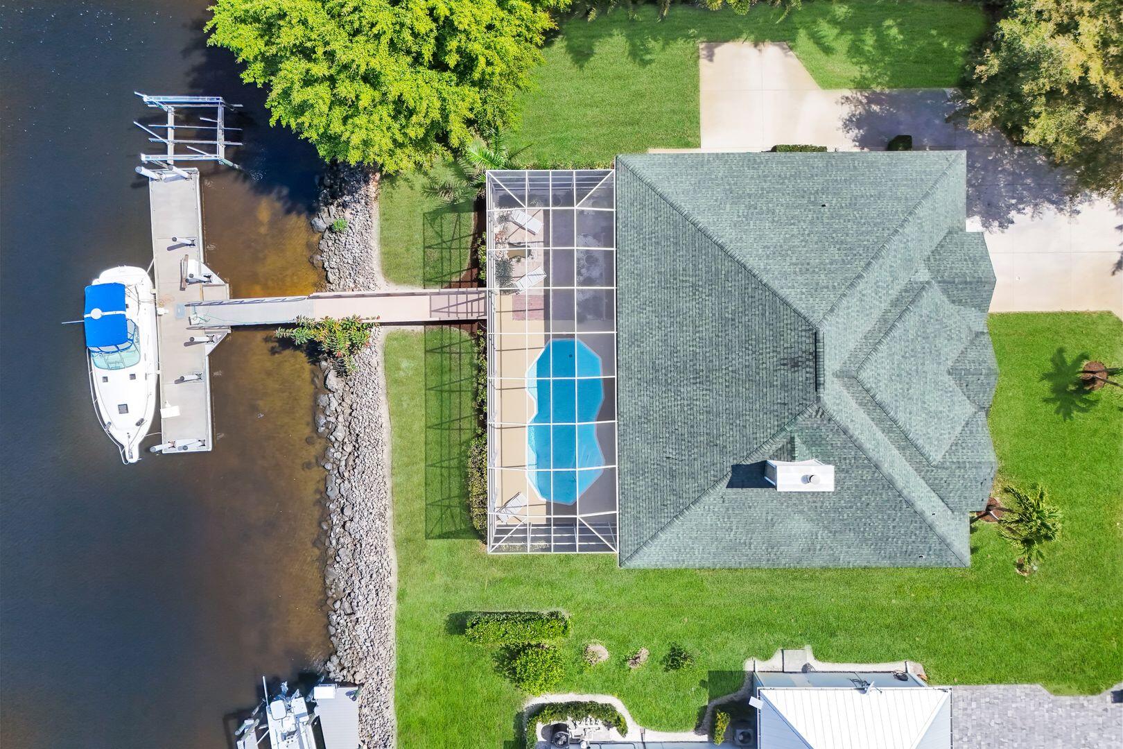 183 Sunset Cay Naples, FL 34114 - Photo 2 of 45 front view of a house with a yard