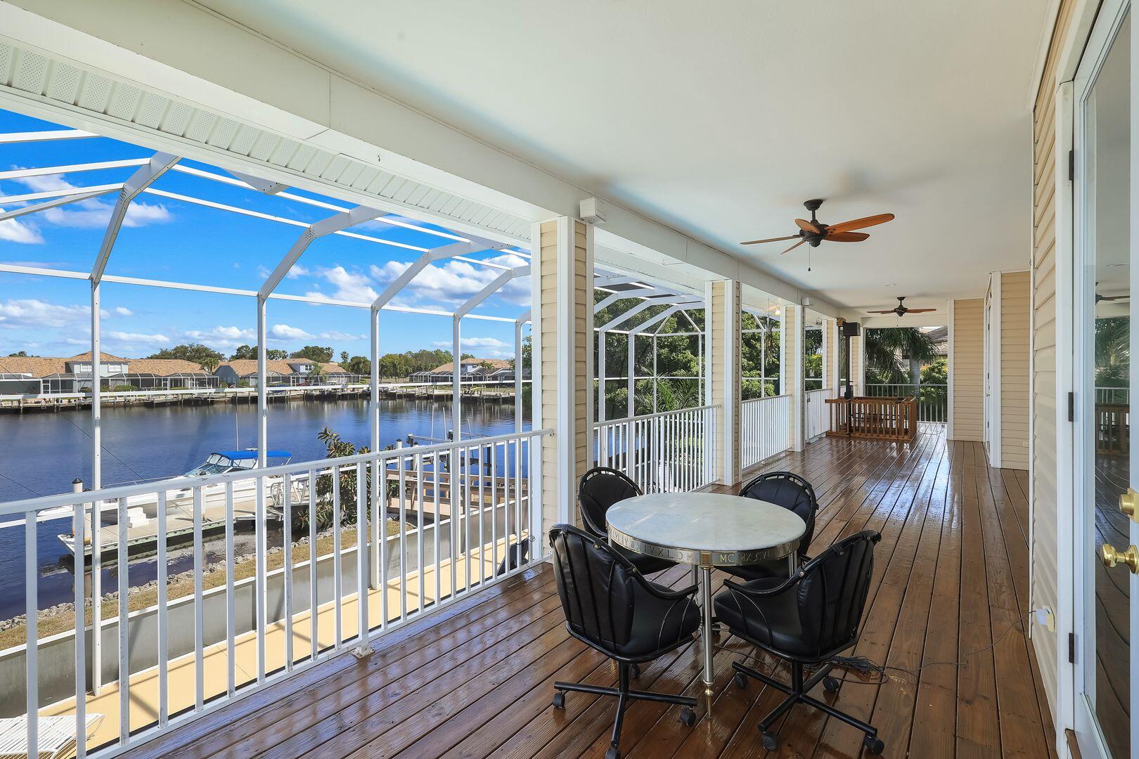 183 Sunset Cay Naples, FL 34114 - Photo 34 of 45 a view of a dining room with furniture window and outside view