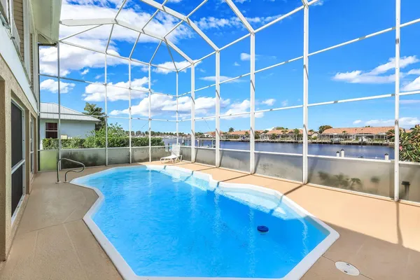 a view of a patio with a backyard