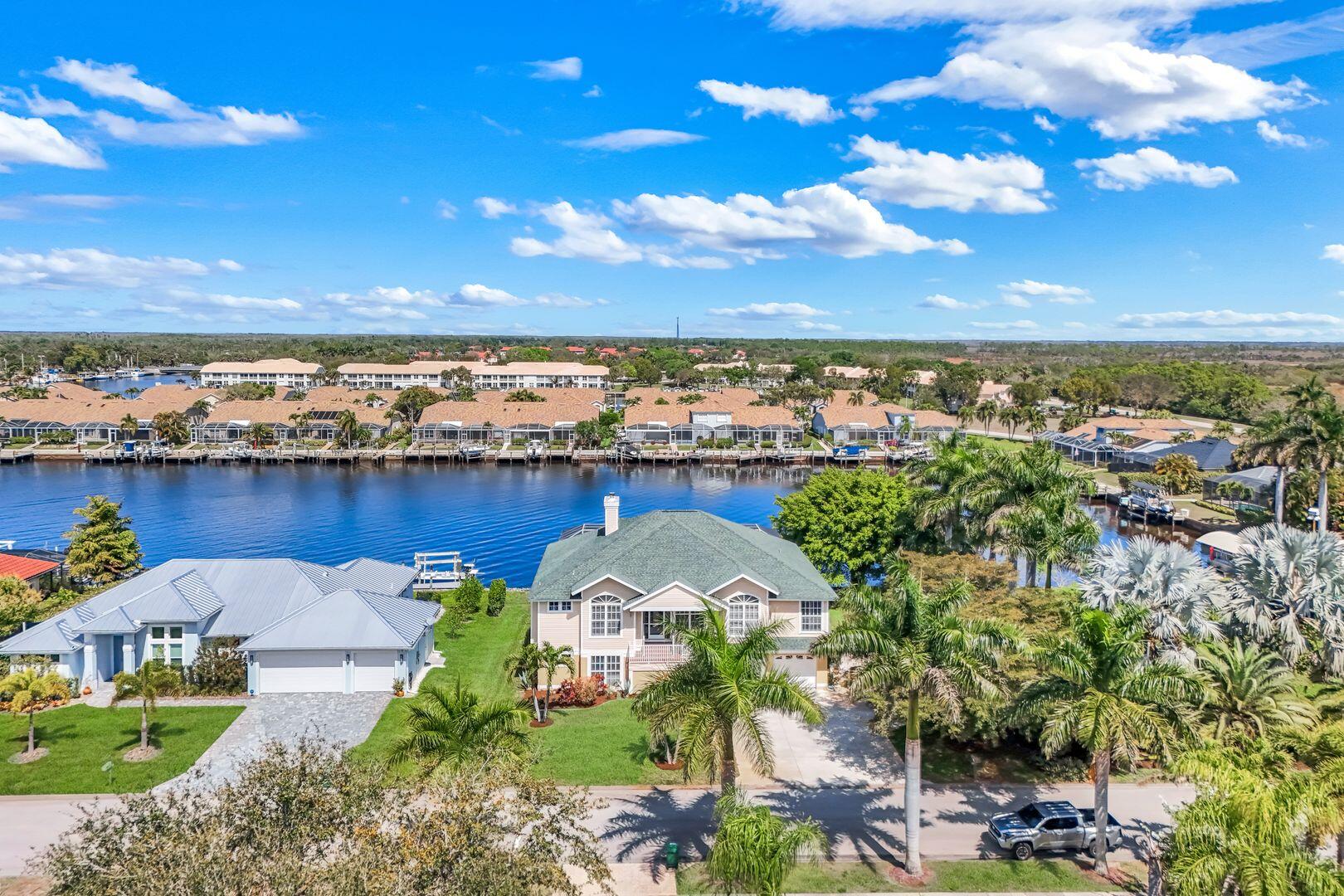 183 Sunset Cay Naples, FL 34114 - Photo 42 of 45 a view of a city with lawn chairs