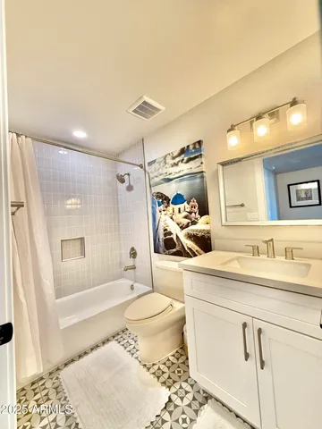 a view of swimming pool with outdoor seating and plants