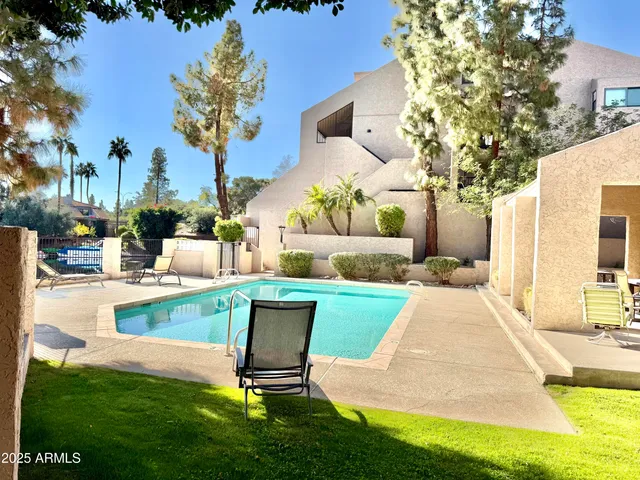 a view of a house with a swimming pool