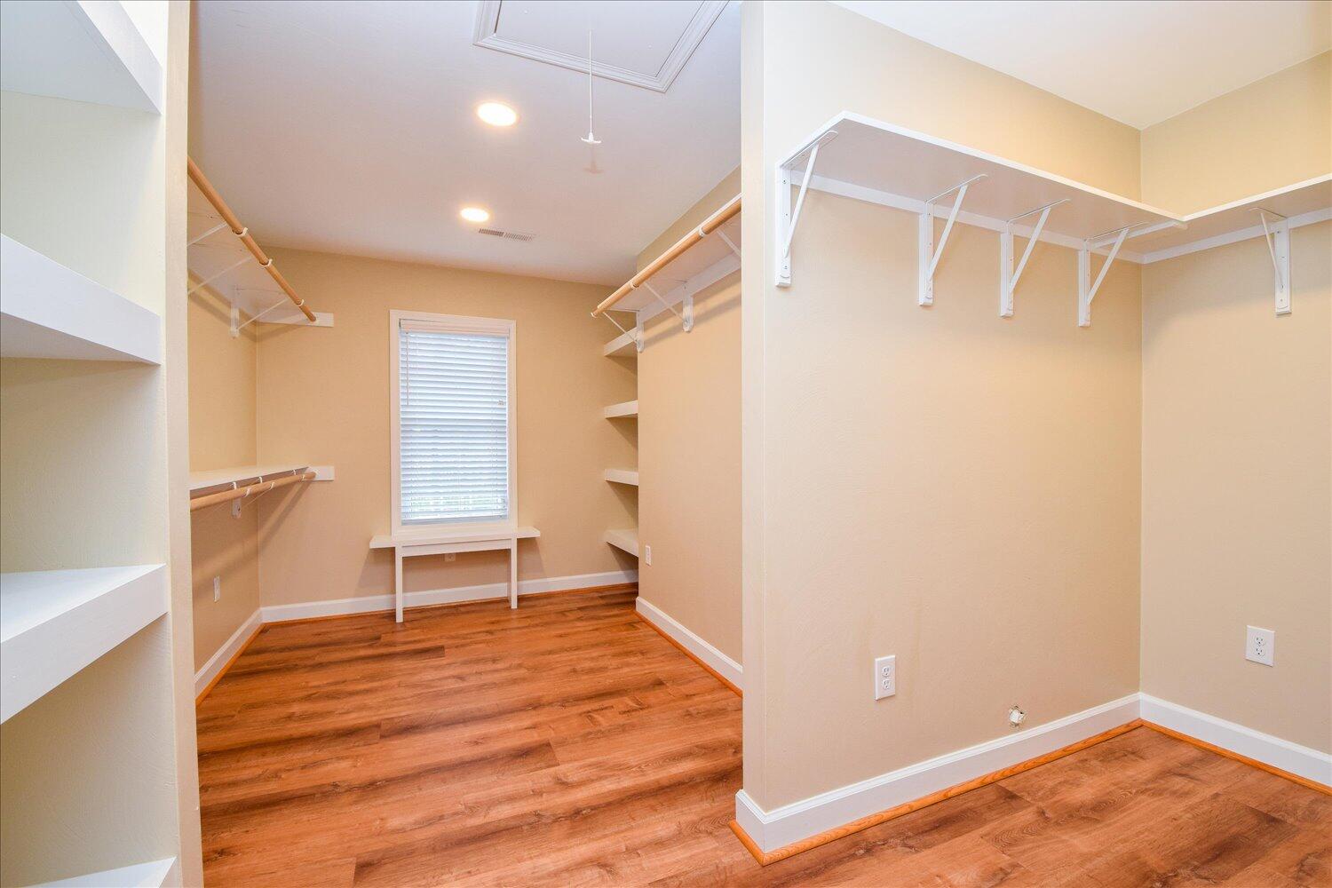 5515 Breckinridge Mill Road Fincastle, VA 24090 - Photo 17 of 31 a an empty room with wooden floor and a window