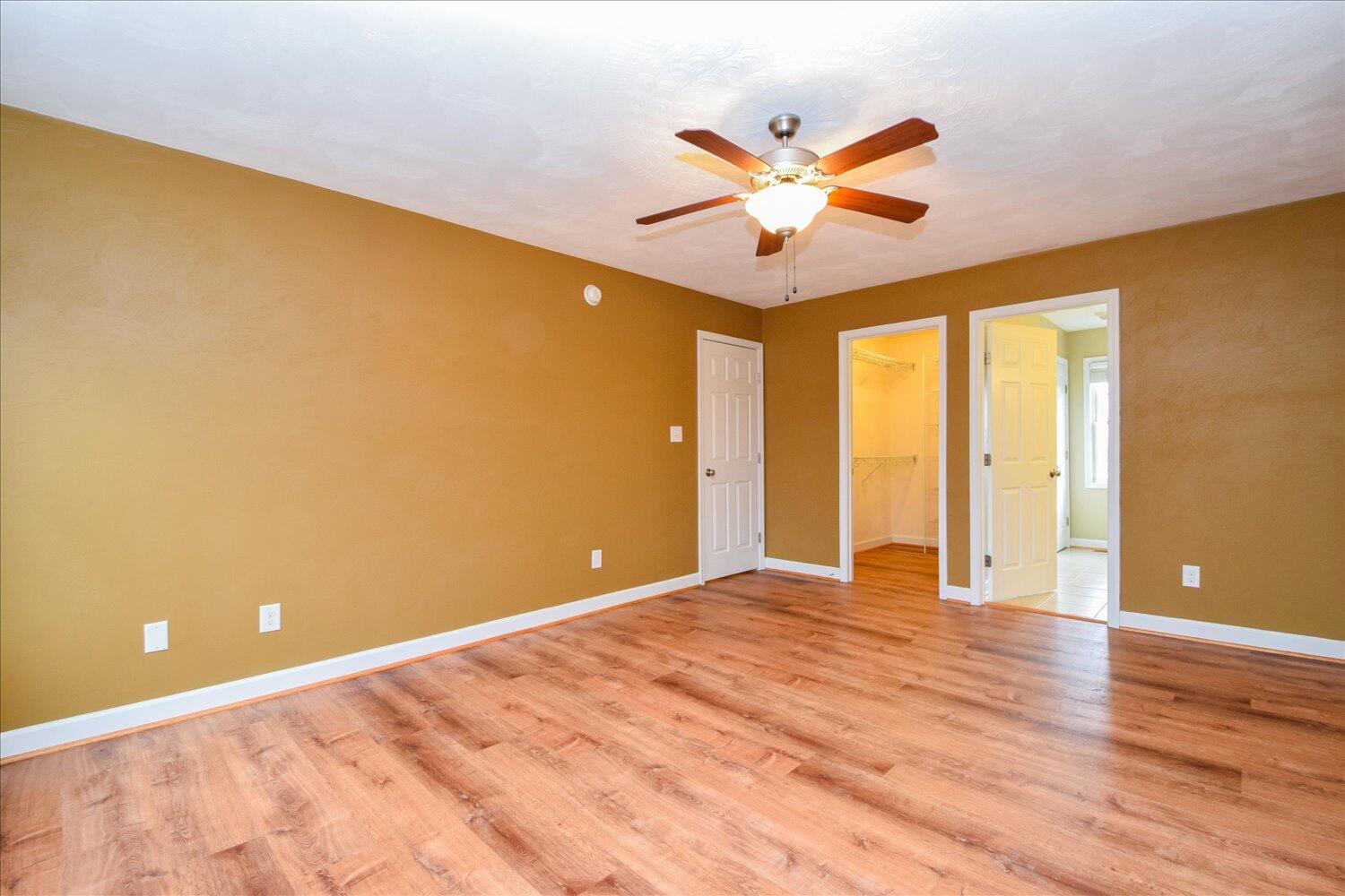 5515 Breckinridge Mill Road Fincastle, VA 24090 - Photo 19 of 31 a view of a big room with wooden floor and windows