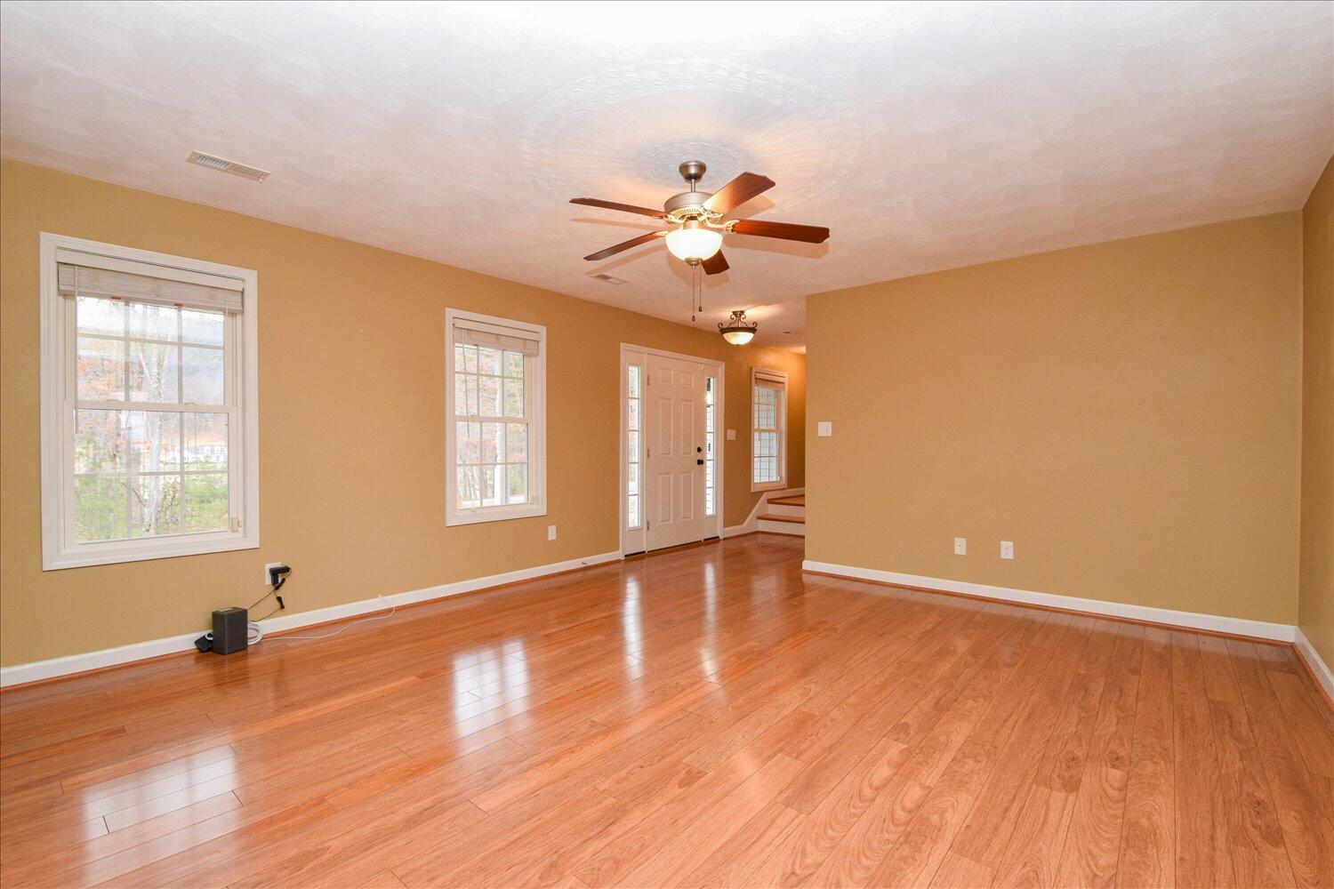 5515 Breckinridge Mill Road Fincastle, VA 24090 - Photo 3 of 31 a view of an empty room with window and wooden floor